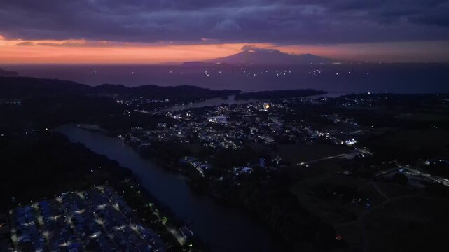 Golden sunset horizon a river surrounding Maragondon Cavite as evening colors spread across the sky.