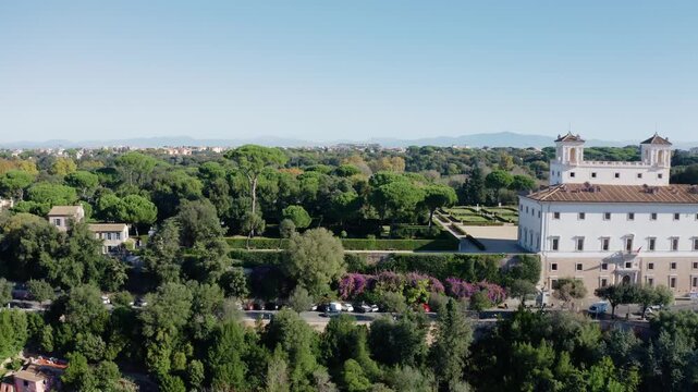 Aerial Drone View of Villa Medici and Renaissance Gardens Surrounded by Lush Trees in Rome, Elegant Historic Residence Above the City Landscape, Lazio Region, Italy