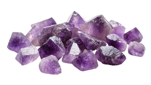 Isolated pile of beautiful natural rough amethyst crystals and healing gemstones for energy