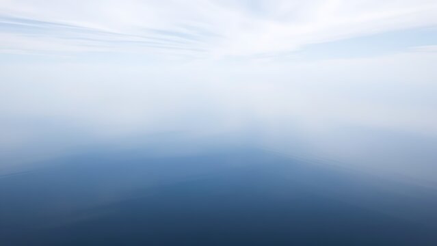 mistreat. A perfectly flat lake mirroring the sky with a seamless horizon. travel magazines, destination branding, designed for outdoor magazines and nature guides and travel destination branding.