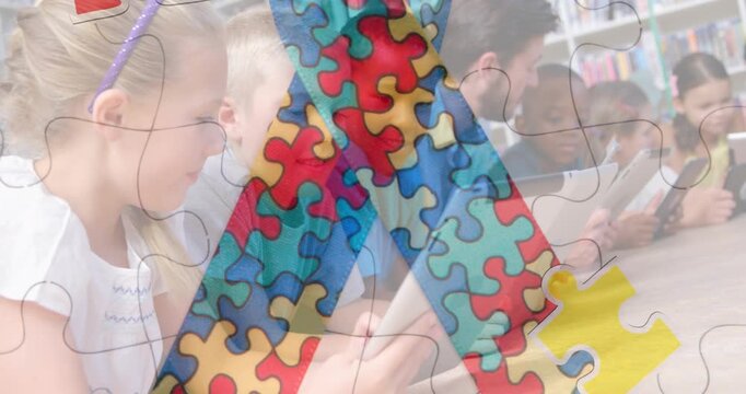 Jigsaw puzzle and ribbon icon against diverse group of students using electronic devices at school