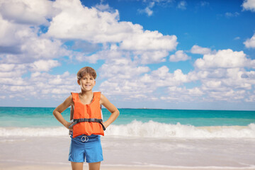 Boy wearing a swim vest