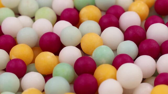 Colorful sweet candy dragee circle rotation close up
