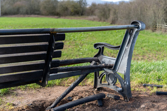 A vandalised burnt bench