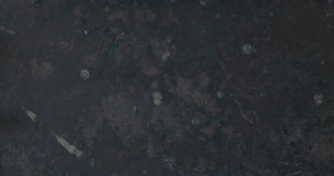 Male hand take a spirulina beverage in the glass, top view, audio included