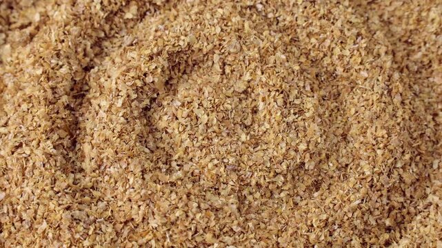Organic Wheat Bran flakes circle rotation close up top view