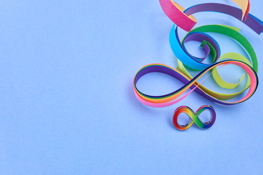 Rainbow infinity symbols representing neurodiversity and autism awareness
