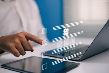 AI document automation digital workflow virtual files, data processing, Man using hand pointing checklist interface on laptop management information, improvement productivity artificial intelligence © Kanokwan