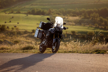 Obraz premium Motorbike at sunset