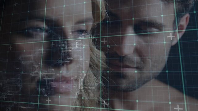Animation of data processing over faces of caucasian couple