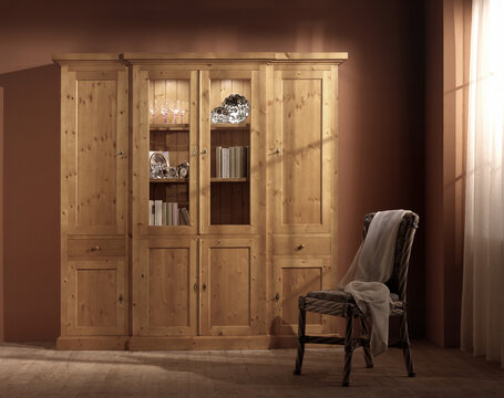 Still life of a wooden display cabinet and rattan chair