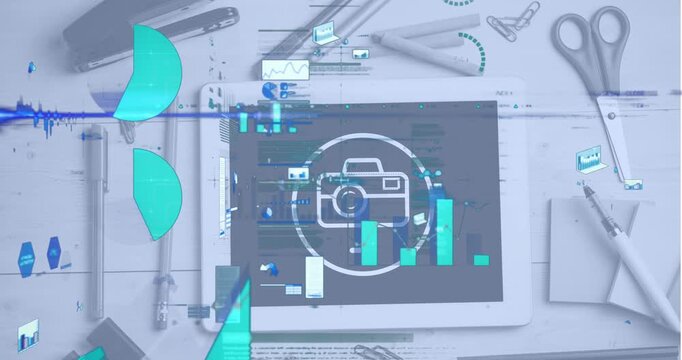 Animation of infographic interface over camera drawing on tablet screen with stationery on table