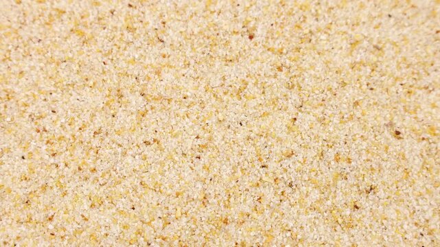 Dried granulated garlic texture circle rotation close up