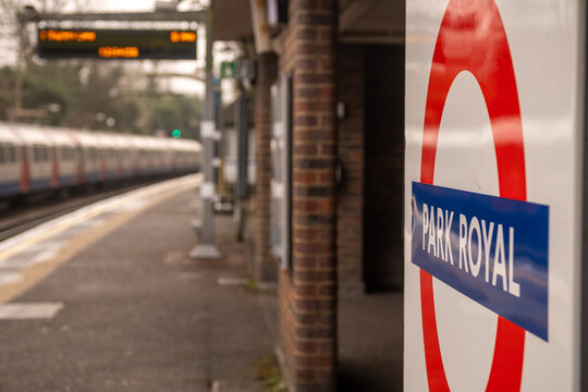 LONDON -  Park Royal tube station &ndash; iconic Underground roundel sign at entrance