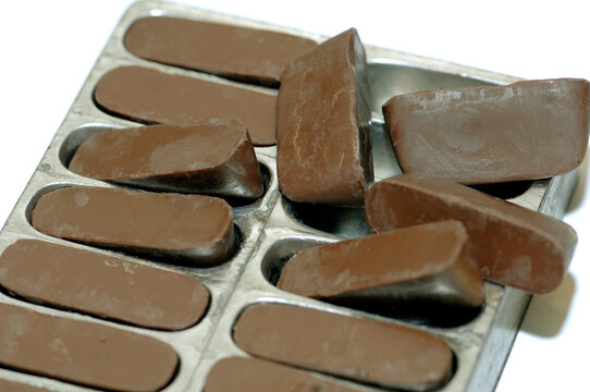 Gianduiotti or Gianduiotto is a typical food from Piemonte or Piedmont area made with cocoa and nuts in Italy