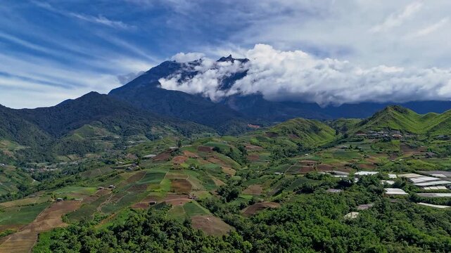 Timelapse of Mt. Kinabalu and agriculture field in Kundasang, Sabah, Malaysia