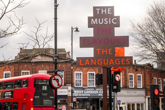 HANWELL, WEST LONDON -  Poetry High Street  sign "The Music The Flavours The Languages" celebrating multiculture