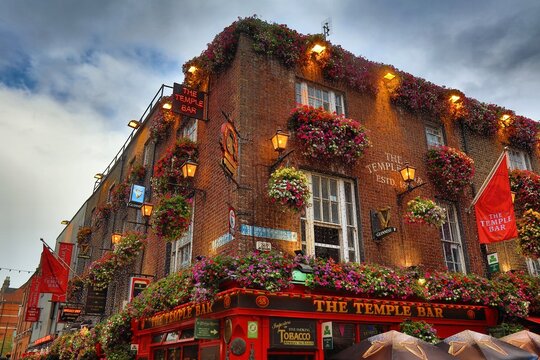 DUBLIN, IRELAND - JULY 5, 2024: The Temple Bar, famous pub in downtown Dublin, Ireland.