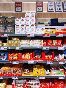 OLSZTYN, POLAND - OCTOBER 13, 2025: Assorted sweet prices in a Lidl supermarket in Olsztyn, Poland.