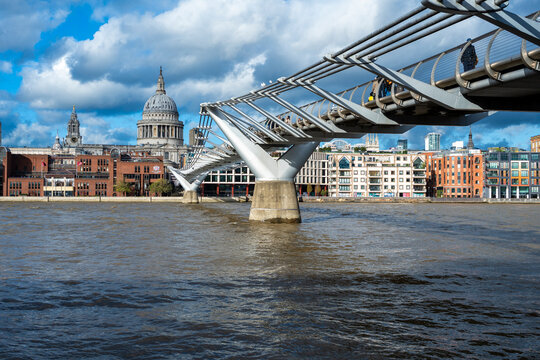 Millennium Bridge over the River Thames with St Paul's Cathedral in the background. London, UK