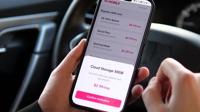 Professional shot of hands interacting with a mobile service interface. Shows scrolling through 5G and social plans followed by cloud purchase confirmation. Perfect for app design showcases and m