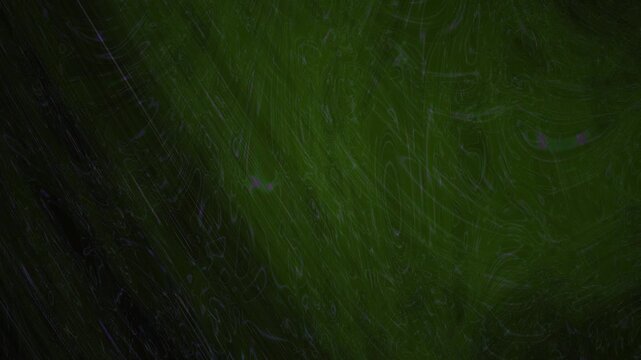 Dark green textured surface background.