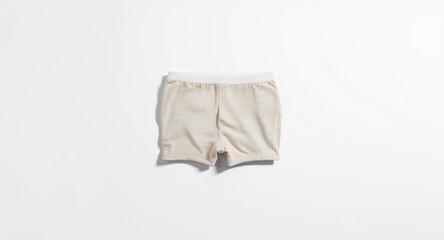 Individual boxer shorts pair arranged on a uniform white platform