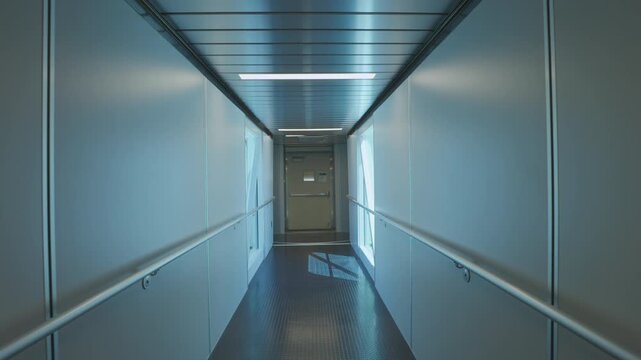 Modern Jet Bridge Interior at Airport Terminal Boarding Gate Walkway for Travel and Aircraft Access