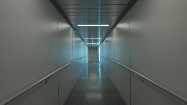 Modern Jet Bridge Interior at Airport Terminal Boarding Gate Walkway for Travel and Aircraft Access