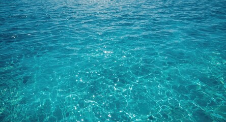 Fototapeta premium Shimmering tropical sea with deep blue water and white sandy seabed