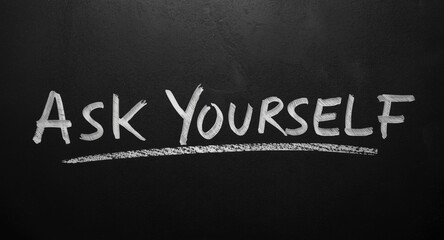 Fototapeta premium Handwritten Ask Yourself text created with marker symbolizing thoughtful introspection