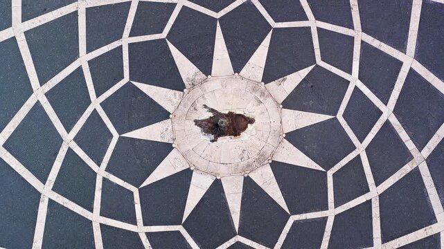 Top-down aerial view of the star pattern pavement of Piazza del Campidoglio by Michelangelo with the Marcus Aurelius statue, Rome, Italy, Europe