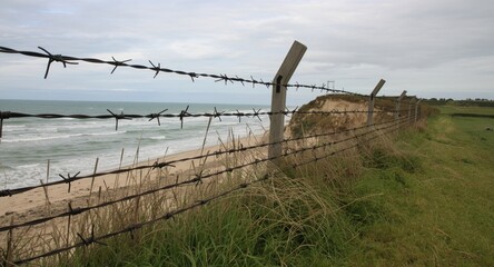 Naklejka premium Defensive barbed wire installations on coastal areas for Normandy invasion in World War II