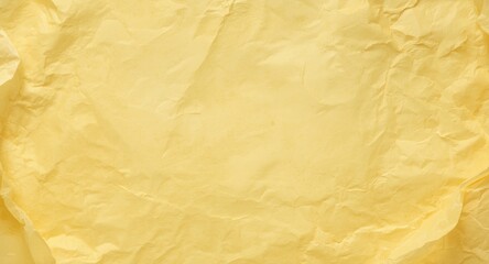 Fototapeta premium folded yellow aged paper backdrop with uneven texture and soft daylight copy space