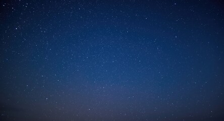 Fototapeta premium Shimmering stars illuminating the sky before dawn