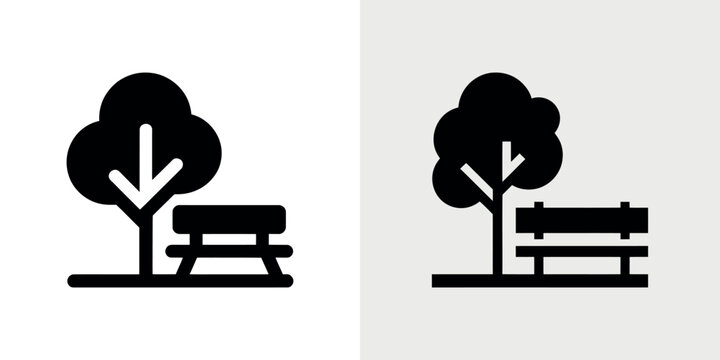 Black silhouettes of tree and bench symbol