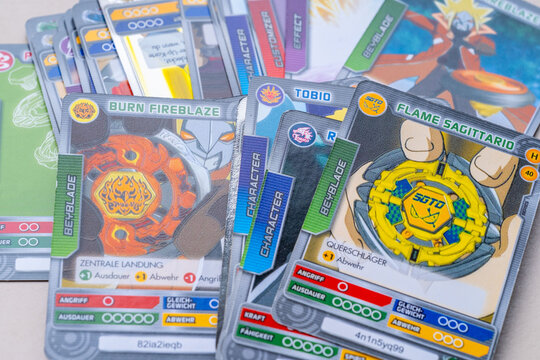 German Beyblade Battle Card Collection trading cards, strategize and enhance character cards with spinning tops, game statistics, Takara Tomy merchandise, collectible game cards, playful pop culture