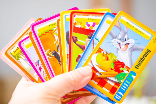 Looney Tunes Sportarena trading cards featuring Bugs Bunny and Daffy Duck, collectible gaming cards on table, variety character cards with sports theme, hobby and fun, playful pop culture collectibles