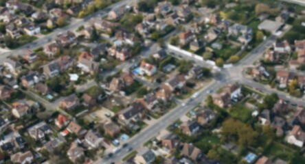 Obraz premium Birds eye view of housing area with tilt shift creating scaled down appearance