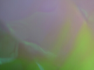 虹色に輝くオーロラ紙の表面を接写した幻想的なテクスチャ