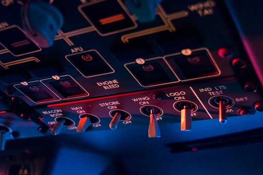 Aircraft cockpit control panel illuminated switches