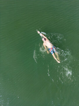 Aerial image of an open water swimmer off Suttons Beach, Redcliffe