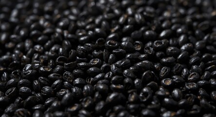 Extreme close up focusing on black cumin seeds' intricate detail