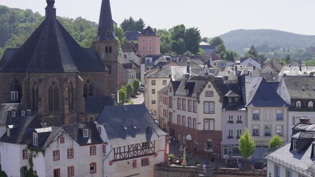 St Laurentius Church overlooks Saarburg old town in Germany.