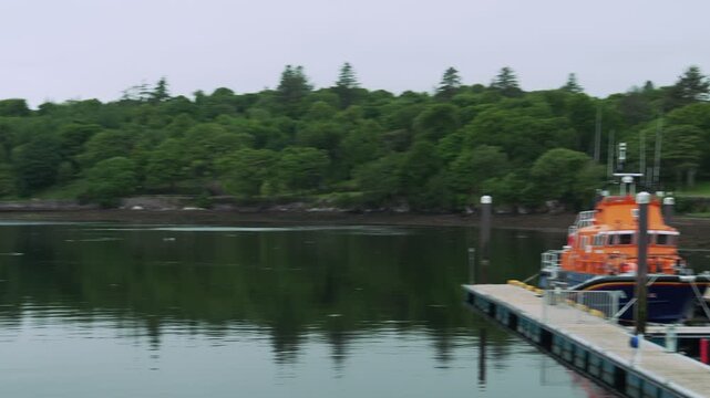 Shot panning from a pier to the harbour pontoons in Stornoway on Lewis.