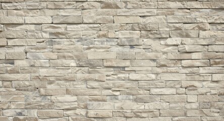 Obraz premium Natural light stone brick wall surface with smooth texture ideal backdrop for editorial design