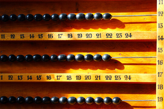 Vintage Wooden Counting Device with Black Beads and Numbers