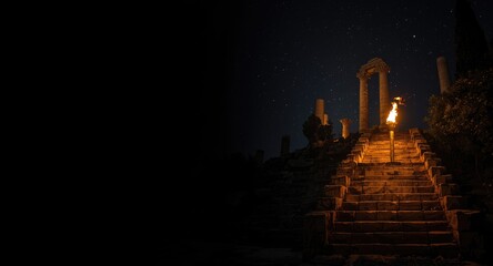 Fototapeta premium Eternal fire glow on stairs leading up to ancient column structures at night