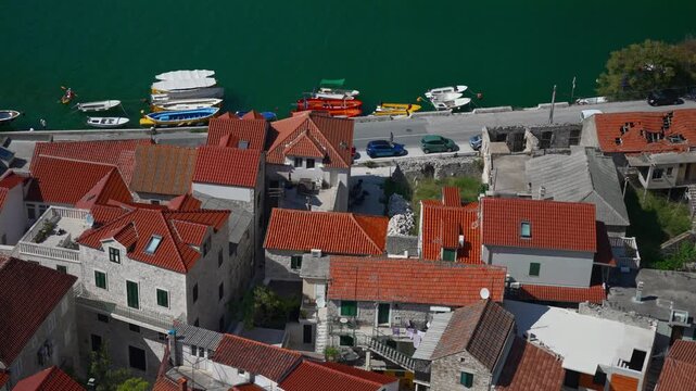 Traditional Mediterranean houses with red clay tile roofs.