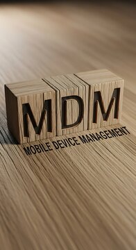 MDM Mobile Device Management Wooden Blocks on Table.